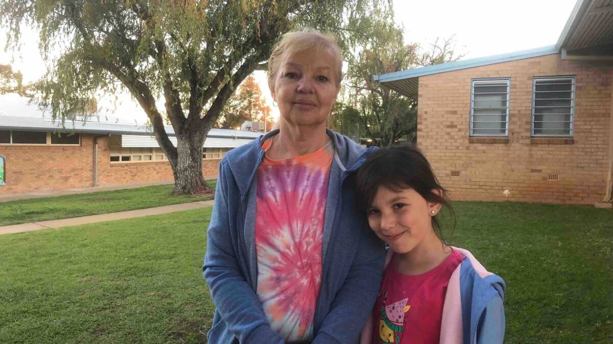 Gillian Clifford, of Flowedale, at Ashmont Public School with her granddaughter Mackayla, aged 8.