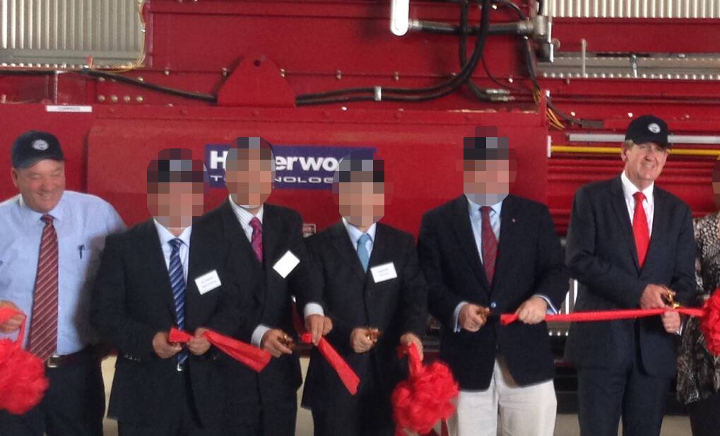 Then-Wagga MP Daryl Maguire (left) and then-NSW Premier Barry O'Farrell (right) open a UWE Hay at Wumbulgal, located 25 kilometres west of Leeton, in 2015. ICAC heard on Thursday that UWE paid Mr Maguire $1400 and paid for his trip to China. Picture: The Irrigator 