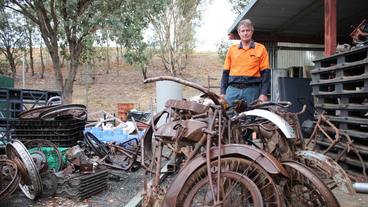 Gregadoo Waste Management Centre Centre manager Geoff Pym, pictured last year with vintage motorcycle frames discovered at the Tip Shop.
