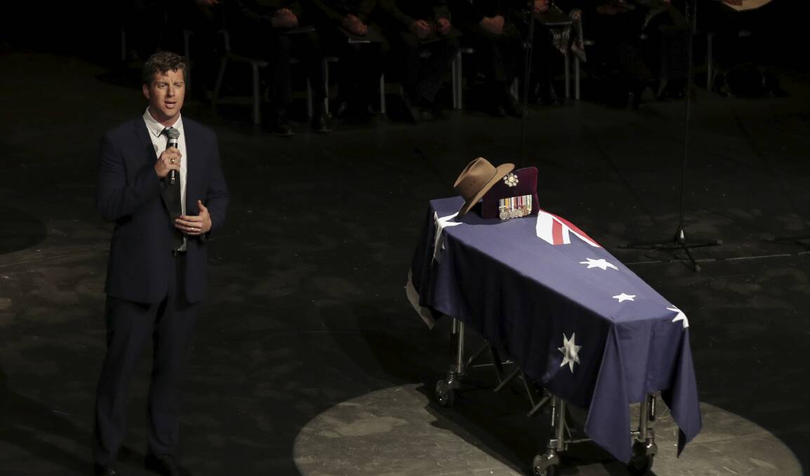 'Amazing Grace' is sung by Thomas Strong at the state funeral for former deputy prime minister Tim Fischer in Albury. Picture: Alex Ellinghausen