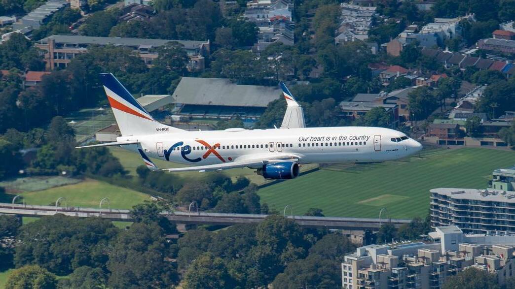 One of Regional Express's new Boeing 737 aircraft in flight over Sydney in January ahead of the launch of its new domestic capital city services in March. Picture: Regional Express/twitter.