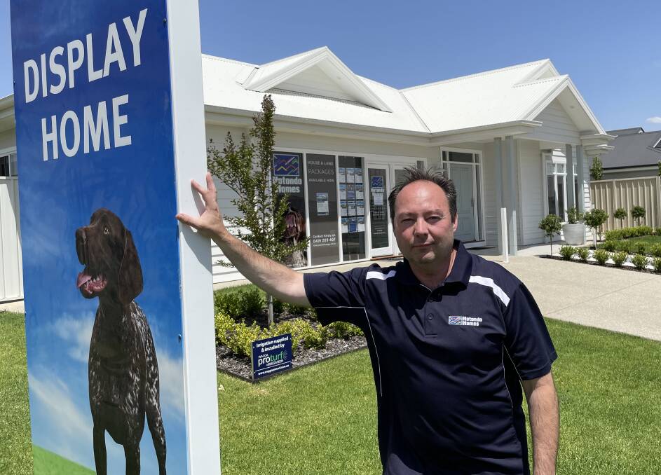 BUSY TIMES: Hotondo Homes builder Craig Keogh at the company's display home in Gobbagombalin. He said the federal government's HomeBuilder scheme had kept him busy. Picture: Rex Martinich 