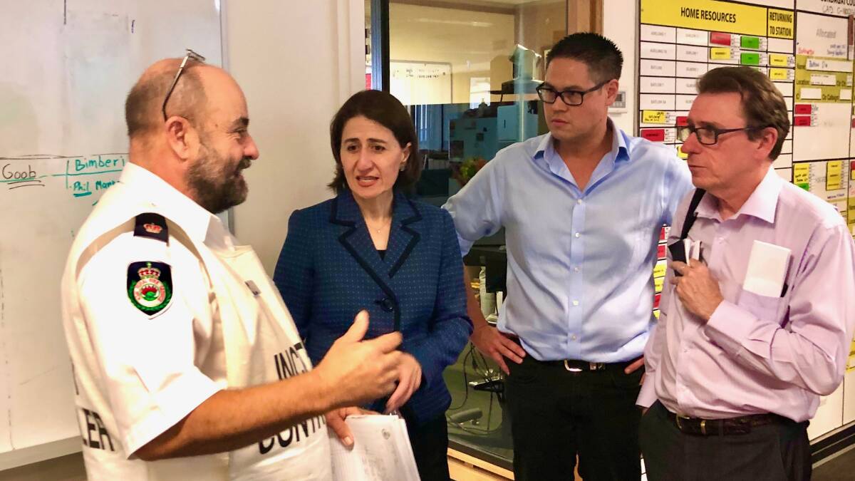 Premier Gladys Berejiklian, Nationals MP Wes Fang and Wagga MP Joe McGirr receive a briefing on the bushfires from Riverina Highlands RFS at Tumut on Thursday. Picture: Contributed.