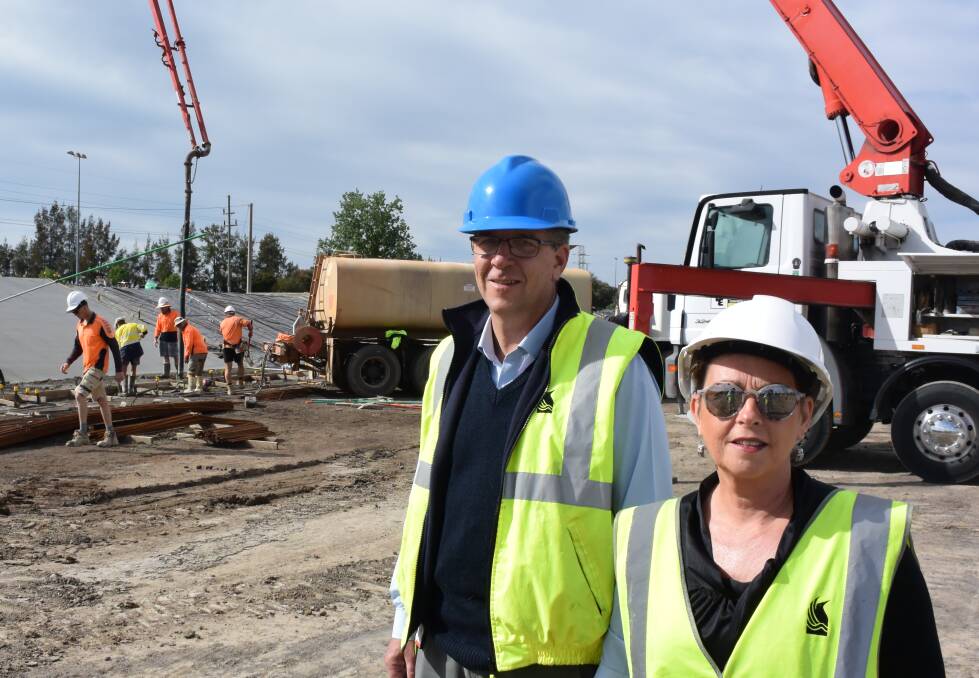 Wagga City Council senior project manager Darryl Woods and director of commercial operations Caroline Angel at the levee site near Kooringal Road in October.