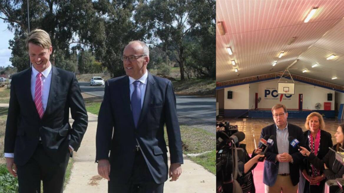 Labor's DanHayes campaigns with opposition leader Luke Foley while Julia Ham is joined by Police Minister Troy Grant on Monday.