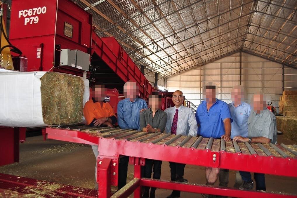 INVESTMENT: United World Enterprises managing director Jimmy Liu, a friend to Daryl Maguire, at the company's hay packing operation outside Leeton in 2015. ICAC has heard Mr Maguire threatened to contact a Chinese Communist leader to help UWE.