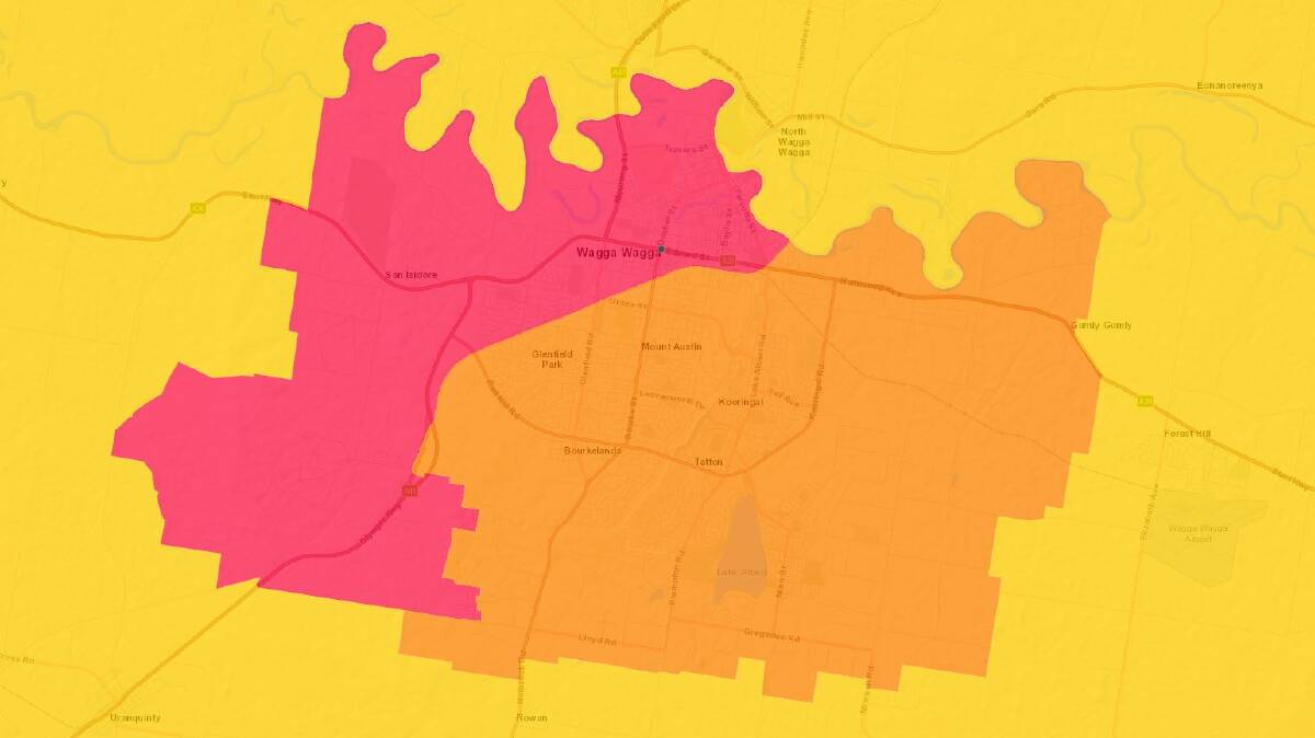 DIVIDING LINE: An NCOSS and University of Canberra map of poverty rates in Wagga shows more people struggling in the west. Pink: 15 to 20 per cent below the poverty line, Orange: 10 to 15 per cent, Yellow: 5 to 10 per cent.