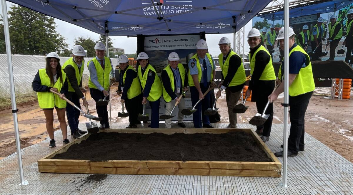 OFFICIAL: Guests of the PCYC, including NSW Police Deputy Commissioner Gary Worboys, turn the first sod at the charity's new centre on Friday. Picture: Rex Martinich