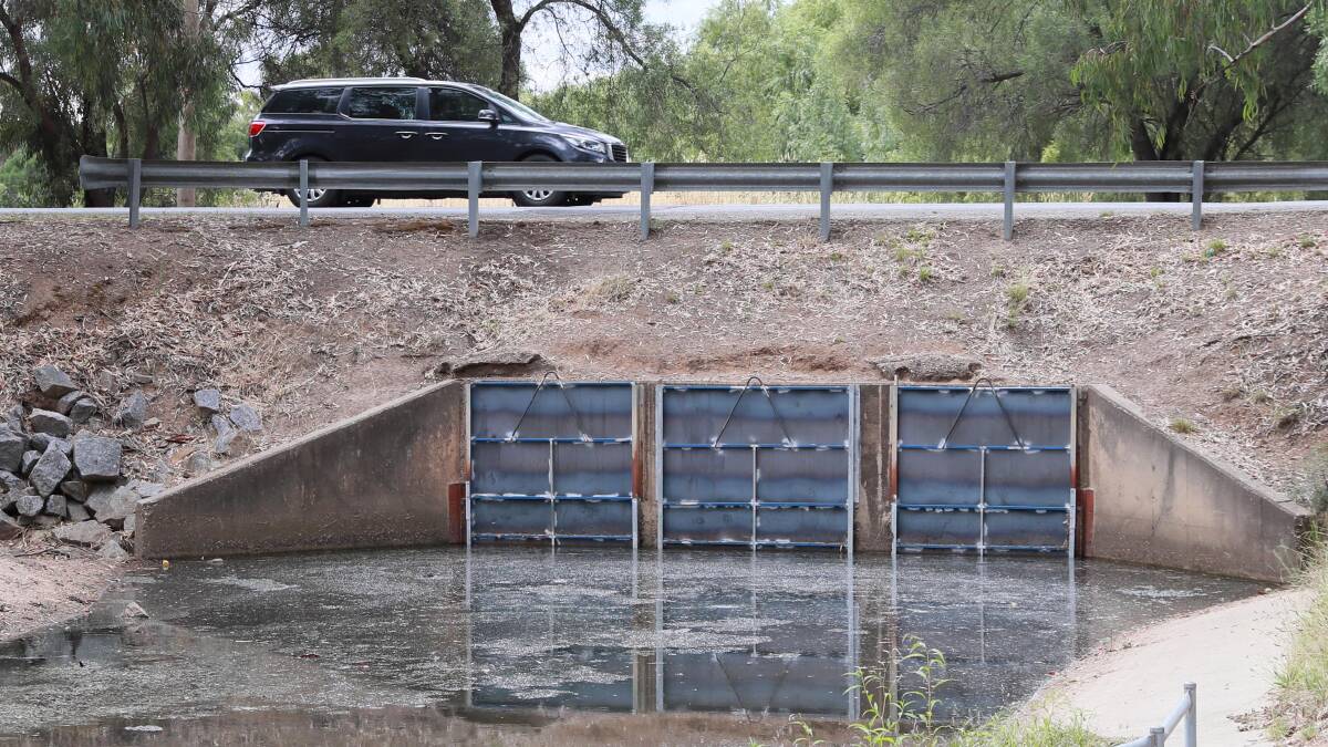Unauthorised shutters that were installed at Tatton Drain in an attempt to divert rainwater into Lake Albert. A Wagga councillor has called for patience as the the city negotiates a long-term solution for lake water levels with the NSW government. Picture: LES SMITH