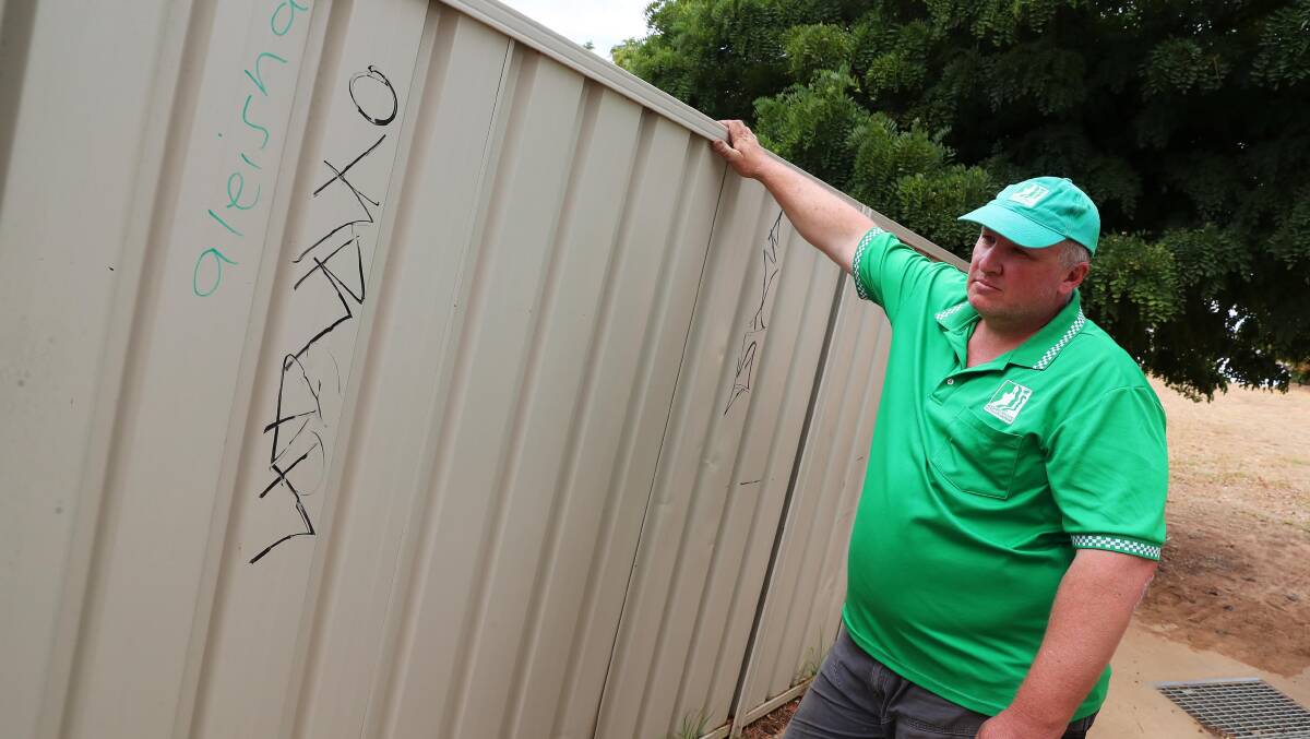 Wagga Neighbourhood Watch president Wayne Deaner in a Glenfield Park pedestrian laneway that nearby residents want closed. Picture: Emma Hillier