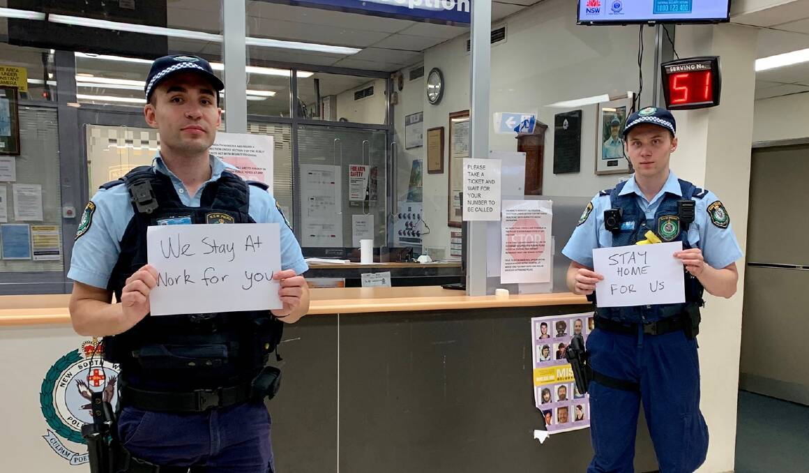NSW Police officers encourage social distancing at Parramatta Police Station during the coronavirus pandemic. Picture: NSW POLICE