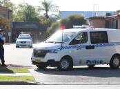 STANDOFF: Police arrest Carl Little at Wagga's Quest Apartments on Gurwood Street in April 2020.