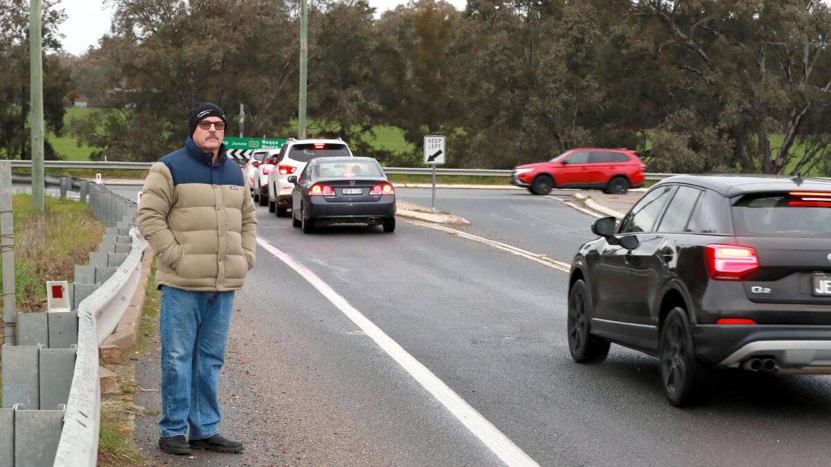 DOUBTS: Estella's Peter Mowbray, who opposes a plan for new traffic lights, stands at the Old Narrandera Road intersection. Picture: Les Smith.