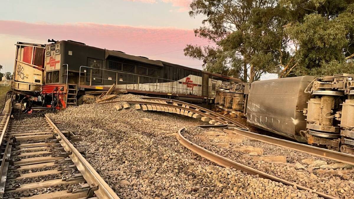 A freight train derailment north of Wagga at Bomen last week. Investigators have found that the train was derailed by a safety system after it passed through a stop signal. Picture: Stewart Alexander/Fire and Rescue NSW