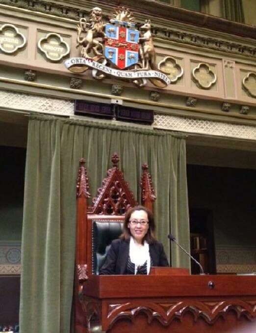 TOUR: Visa scheme consultant Maggie Wang sits in the Speaker of the House's chair after being invited to Parliament House by then-Wagga MP Daryl Maguire. Picture: ICAC