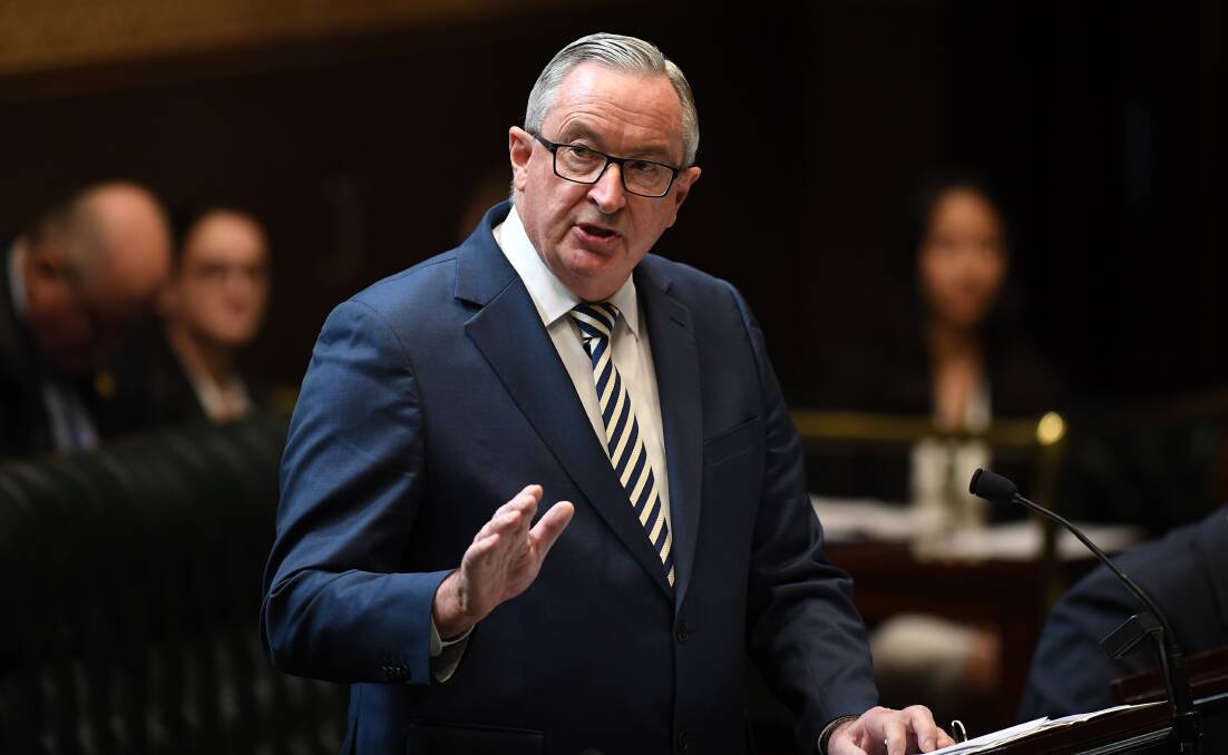 NSW Minister for Health and Medical Research Brad Hazzard speaks during a debate of the Reproductive Health Care Reform Bill in Parliament on Tuesday. AAP Image/Joel Carrett
