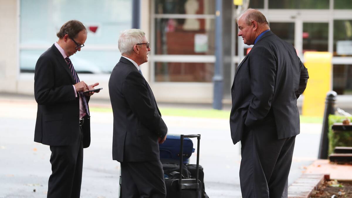 Former Wagga council general manager Alan Eldridge (right) outside court with his senior counsel John Fernon (centre) and barrister David Mackay. Picture: Emma Hillier