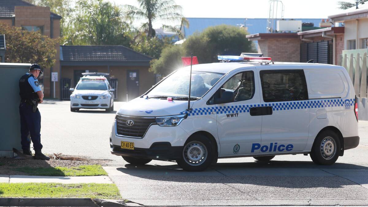 STANDOFF: Police arrest Carl Little at Wagga's Quest Apartments on Gurwood Street in April 2020.