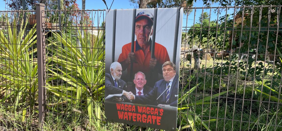 WATERGATE: A poster in support of Wagga council election candidate Mick Henderson near the Plumpton and Kooringal roads roundabout.