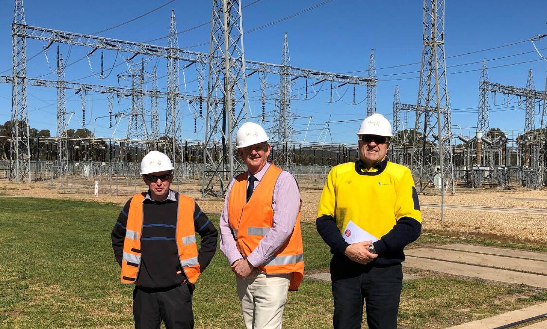DISCUSSION: TransGrid representatives meet with then Wagga mayor Greg Conkey in 2018 at the electricity substation at Gregadoo. Picture: TransGrid