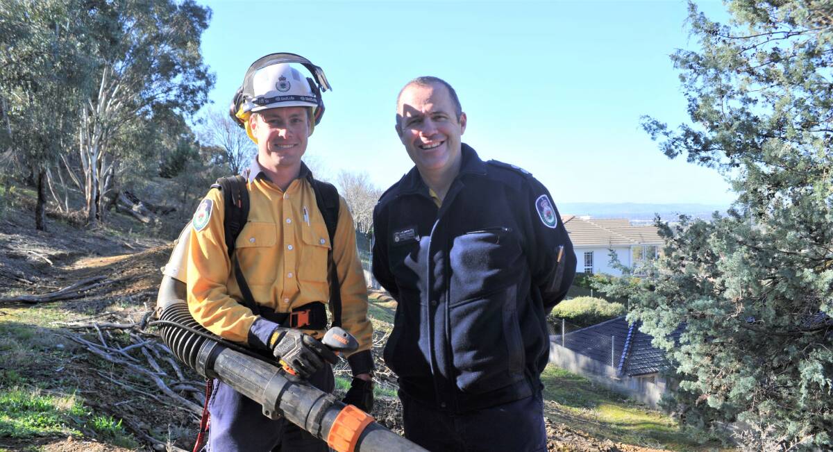PROACTIVE ACTION: Wagga Rural Fire Service crew leader Ben Adams and Operational Officer Bradley Stewart at Willans Hill conducting some hazard reduction activities to ensure community safety. Picture: Toby Vue