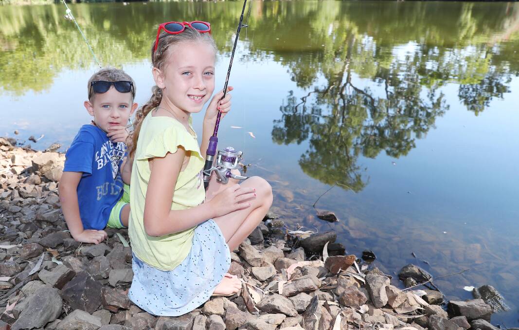 KEEN ANGLERS: Siblings Kobi Smith, 4, and Jade Smith, 7, from Wagga at the 2018 Fisherama in March. The 2019 edition is in doubt after Wagga City Council received a complaint about turtle deaths.