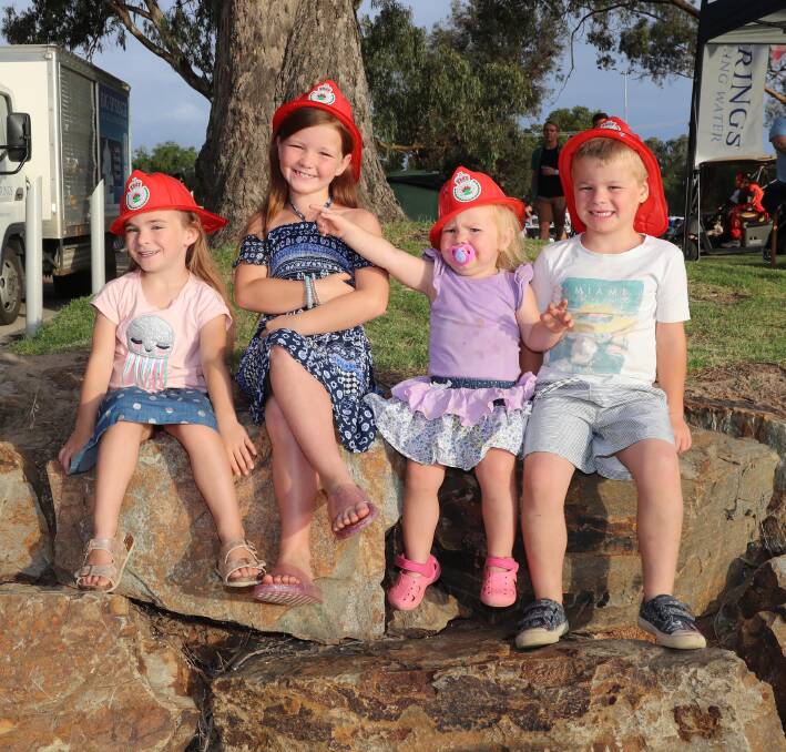HAVING A BLAST: The Price kids from Uranquinty: Willow, 5, Lilly, 7, Addaline, 2 and Henry, 5, enjoy the sun before the fireworks display. Picture: Les Smith