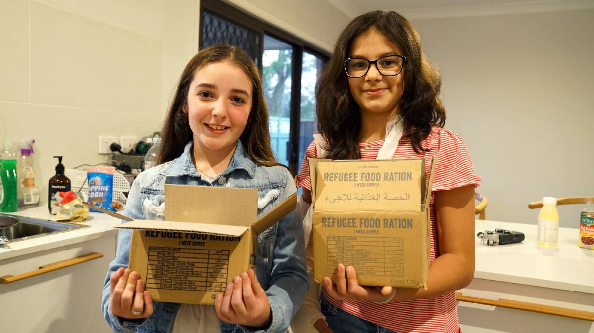 HELPING OTHERS: Soufia and Arielle, aged 11, took part in last year's Ration Challenge. Picture: Supplied
