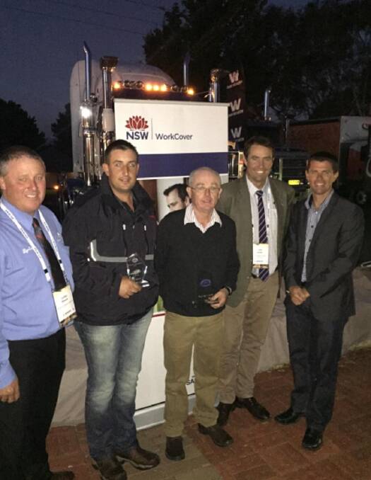 YOUNG DRIVER: Reggie Sutton (second from left) with other members of the Livestock, Bulk and Rural Carriers Assocaition: President Lynley Miners, life member
Barney Hayes and past president Jock Carter, as well as Jeremy Whyte from SafeWork NSW. Picture: Supplied