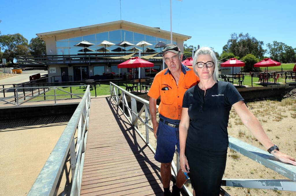 STAYING AFLOAT: Wagga Boat Club's Commodore Mick Henderson and administration manager Anna Bolton have announced a new strategy to combat the financial woes that flow from Lake Albert. Picture: Les Smith