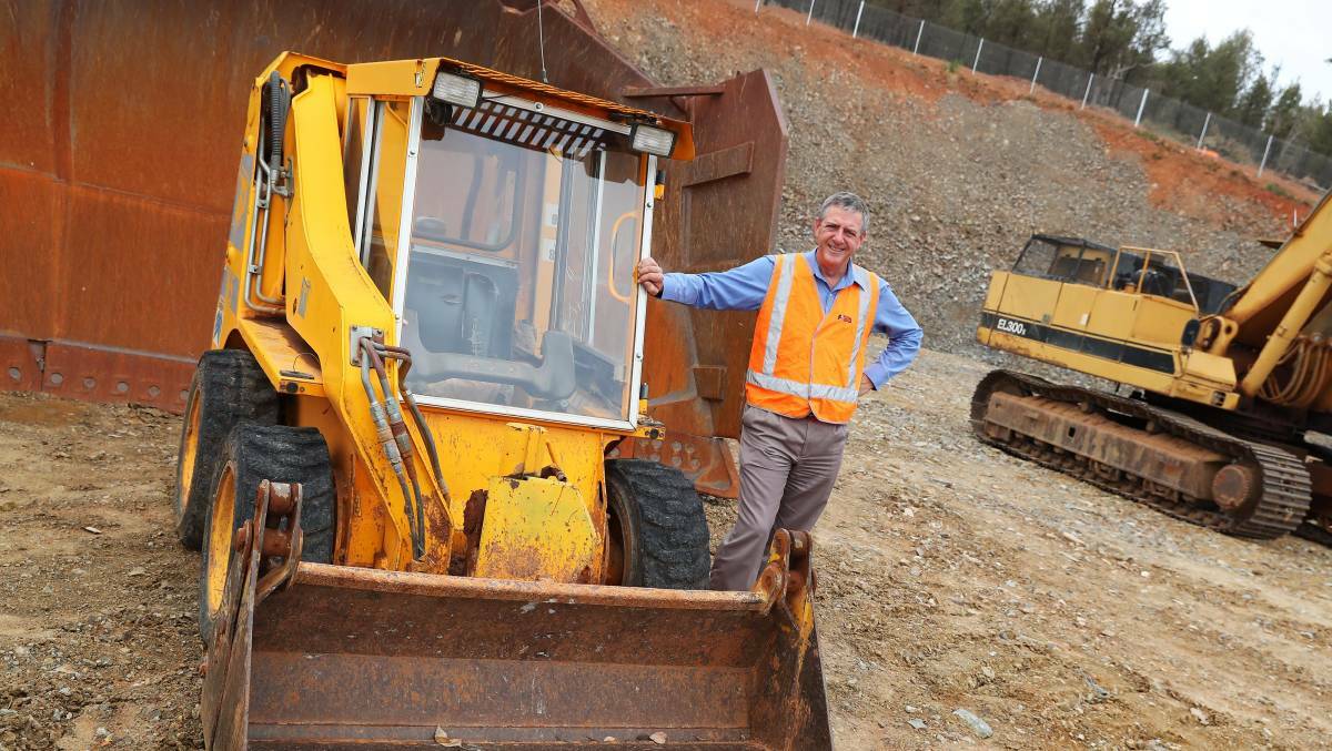 NEXT STAGE: Riverina Water engineering director Bede Spannagle with the equipment that excavated space for new reservoir tanks at Willians Hill. Picture: Emma Hillier