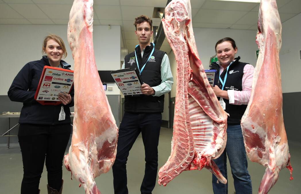 LEARNING THE ROPES: Lauren Rowlands, University of Tasmania, Cameron Steel, University of New England and Gabby Parker, Central Queensland University judging meat at CSU Wagga. Picture: Les Smith