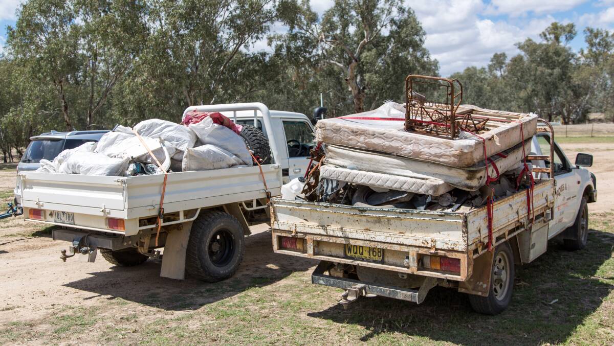 Two utility vehicles with the rubbish collected on Sunday at Eunony Reserve. Picture: Supplied