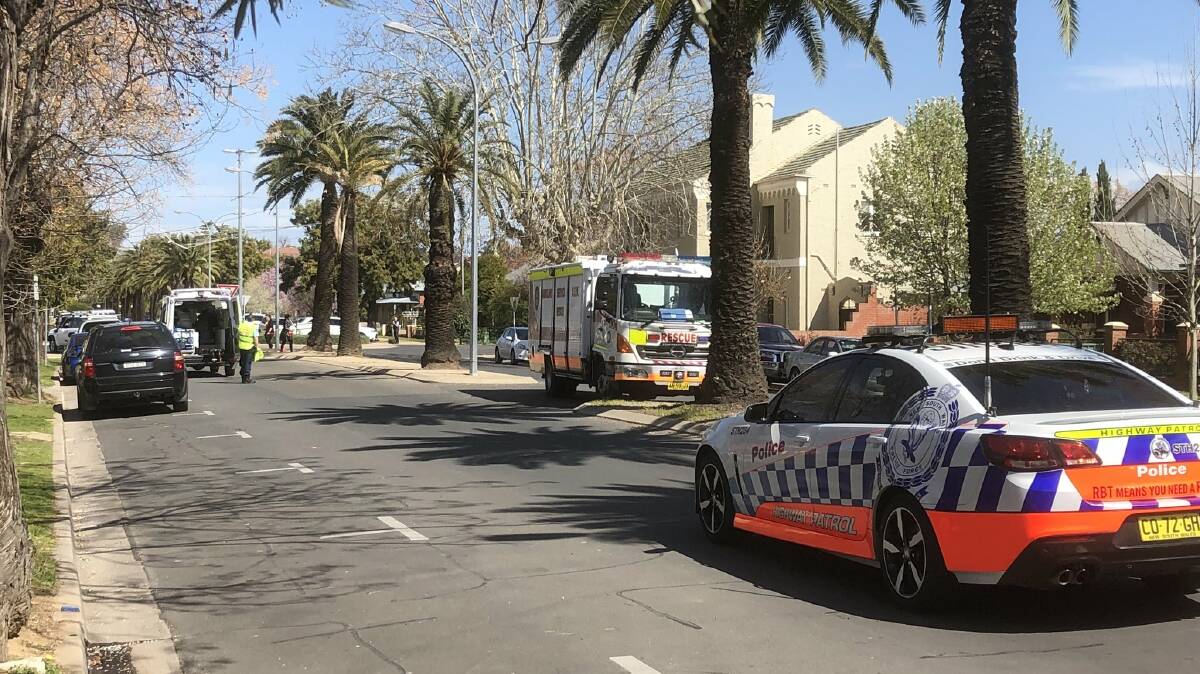 TRAFFIC AFFECTED: Emergency services at the site where the 21-year-old female suffered a fall after lunch today. Picture: Rex Martinich