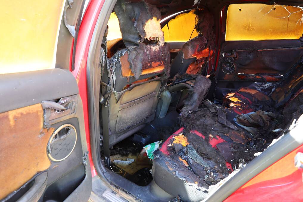 DESTROYED: The interior of the burnt Commodore in Mt Austin. Picture: Emma Hillier