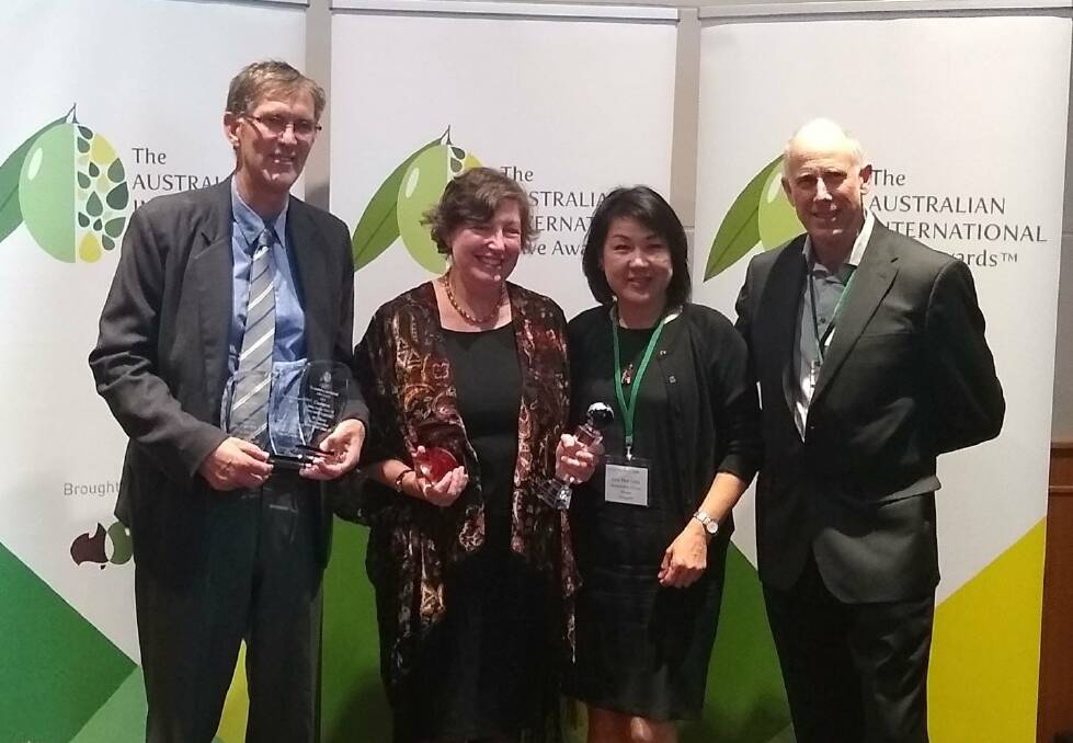 Best EVOO of Show winners: W2Olives' Geoffrey Treloar and Jenny Masters and their processors, Wollundry Grove's Joo-Yee Lieu and Bruce Spinks. Picture: Australian Olive Association