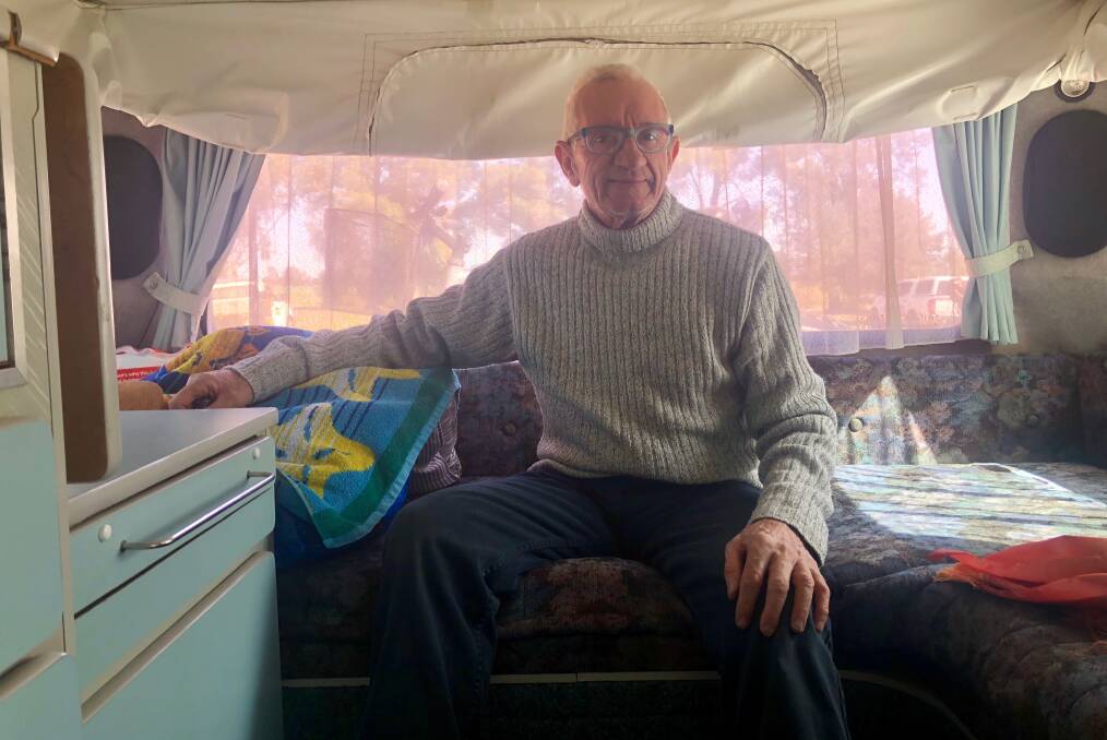 John Howard inside his caravan at the 2018 Burning Seed Festival. Picture: Toby Vue