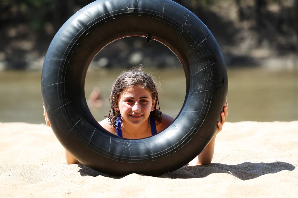 Eva Sutton, 12, enjoys a day out at Wagga Beach. Picture: Emma Hillier