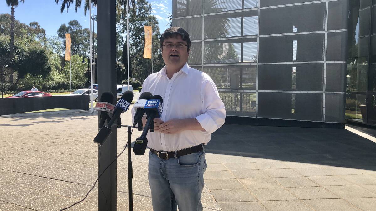 REMAINING CONFIDENT: Following the Toowoomba announcement, Wagga City Council's general manager, Peter Thompson, addresses the media about Wagga's bid. Picture: Toby Vue
