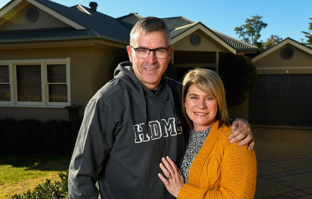 GRATEFUL: Geoff Reid with his wife, Cathy, at their Wagga home.
