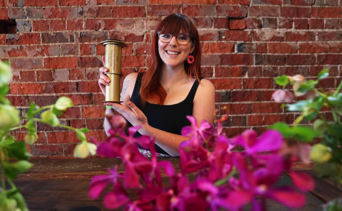 TAKING ON THE WORLD: Isabella Willis, head barista at The Blessed Bean, with her gold Aeropress from the 2018 Australian Aeropress Championship. She will now compete at the World Aeropress Championship in Sydney in November. Picture: Emma Hillier