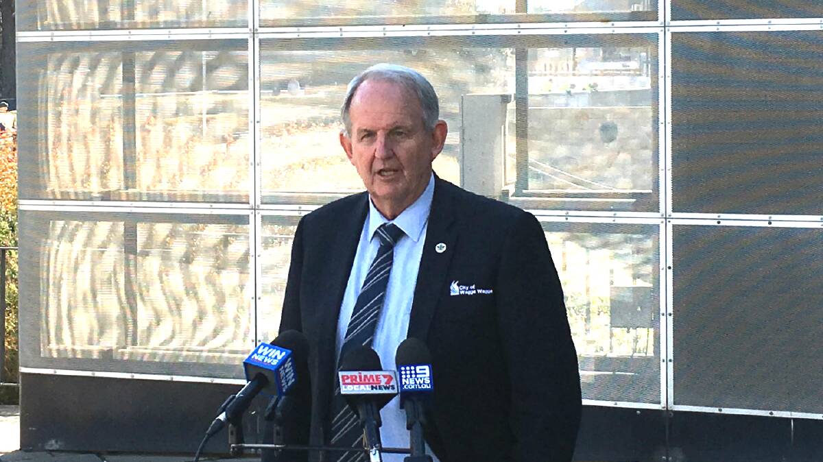 LEADING THE BID: Wagga Mayor Greg Conkey speaks at a media conference in July when Qantas executives visited. Picture: Rex Martinich