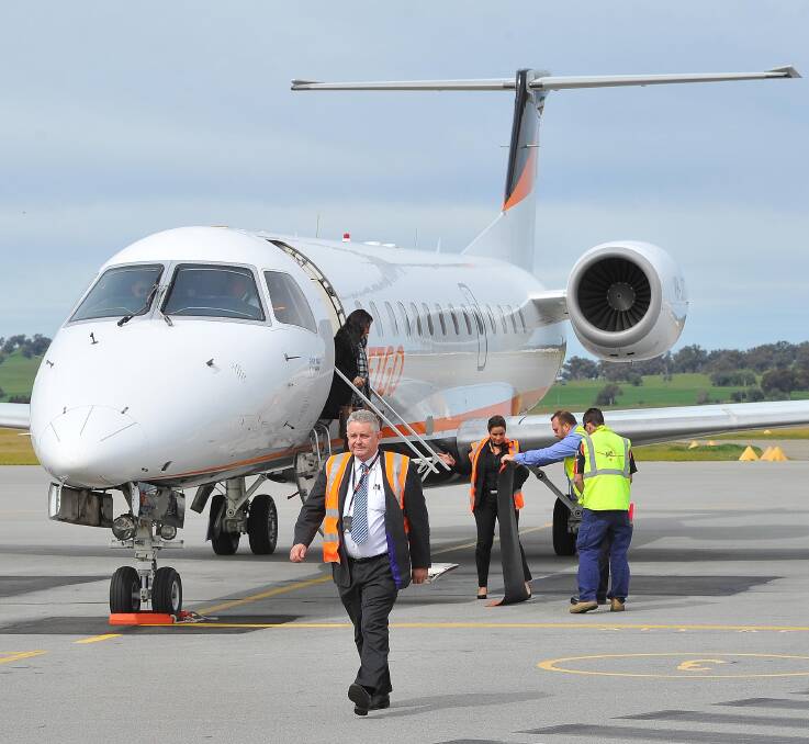 END OF SERVICE: JetGo's managing director Paul Bredereck steps off the plane at Wagga Airport in 2016.

