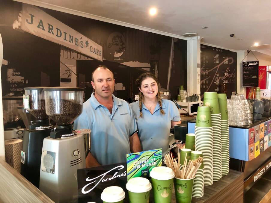 BEATING HEAT: Matt Cunneen, owner of Jardine's Cafe, with employee Amy Perez. The cafe performed well during the recent extreme heat. Picture: Toby Vue