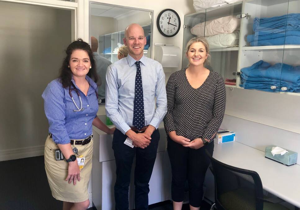 SAVING LIVES: intern doctors Kerby Siemsen (left) and Tayla Coles (right) with Dr Chris Mumme at the UNSW Rural Clinical School. Picture: Toby Vue