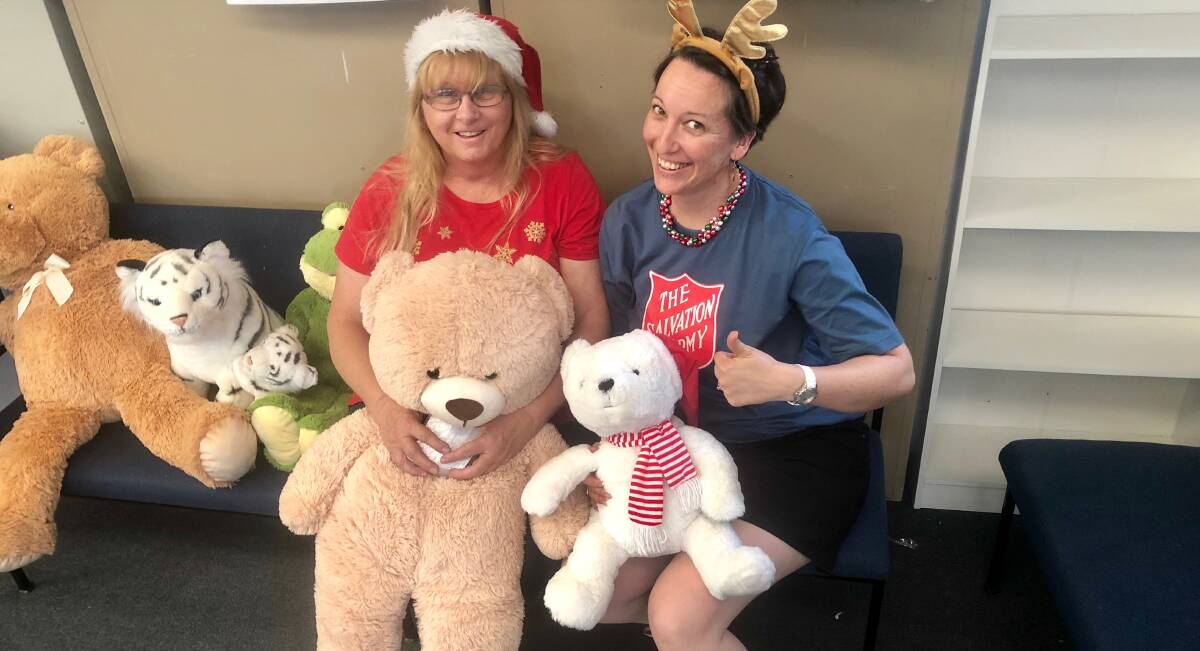 COMPASSION: Judy Allen and Kara Hartley at Wagga's Salvation Army welcomed the help from Kate Bower this Christmas. Picture: Toby Vue
