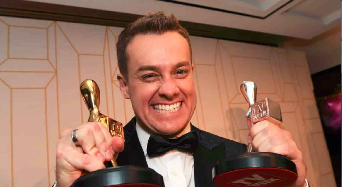 RECOGNISED: Grant Denyer with his two Logies. Picture: AAP