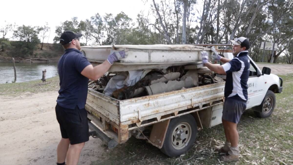 CLEAN ENVIRONMENT: Cameron Copeland and Morgan Jaques were part of the OzFish Wagga cleanup operation last Sunday at Eunony Reserve. Picture: Supplied
