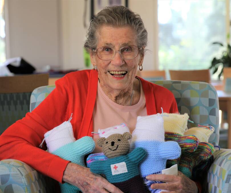 HELPING HAND: Ingenia Gardens resident Val Merchant has been knitting the trauma teddies every two days for those in need. Picture: Steff Wills 