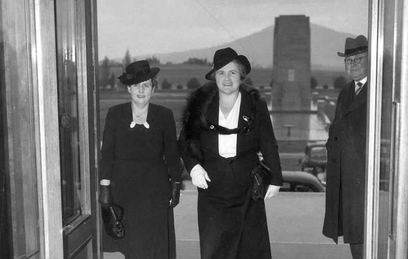 Dorothy Tangney (left) and Enid Lyons walk through the doors of Old Parliament House on September 24, 1943 as its first female politicians. Picture: Australian War Memorial